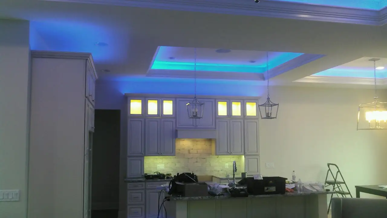 Kitchen mid-install with blue LED in the ceiling
